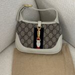 Gucci Small Jackie 1961 shoulder bag in beige GG Supreme canvas with white