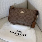 Coach Nolita 19 in signature canvas