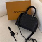 Louis Vuitton Alma BB bag in black Monogram Empreinte leather