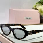 Miu Miu cat-eye acetate sunglasses in a havana