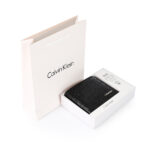 ⁦Calvin Klein bifold wallet featuring an all-over monogram logo print⁩ - الصورة ⁦2⁩