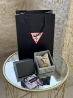 ⁦Guess Ladies Fame Gold Tone Triangular Crystal Watch GW0508L2⁩ - الصورة ⁦5⁩