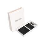Calvin Klein Men's embossed logo wallet, card case, and keychain set.