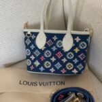Louis Vuitton handbag featuring Monogram denim with colorful embroidered floral