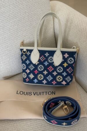Louis Vuitton handbag featuring Monogram denim with colorful embroidered floral