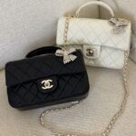 Chanel Mini Classic handbag with a top handle