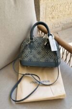 Louis Vuitton bag is the Alma BB crafted from denim monogram