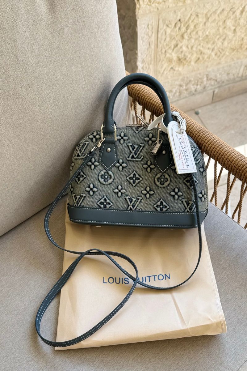 9 Louis Vuitton bag is the Alma BB crafted from denim monogram - תמונה 1