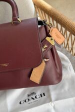 ⁦Coach Slouchy Rogue Top Handle Bag⁩ - الصورة ⁦2⁩